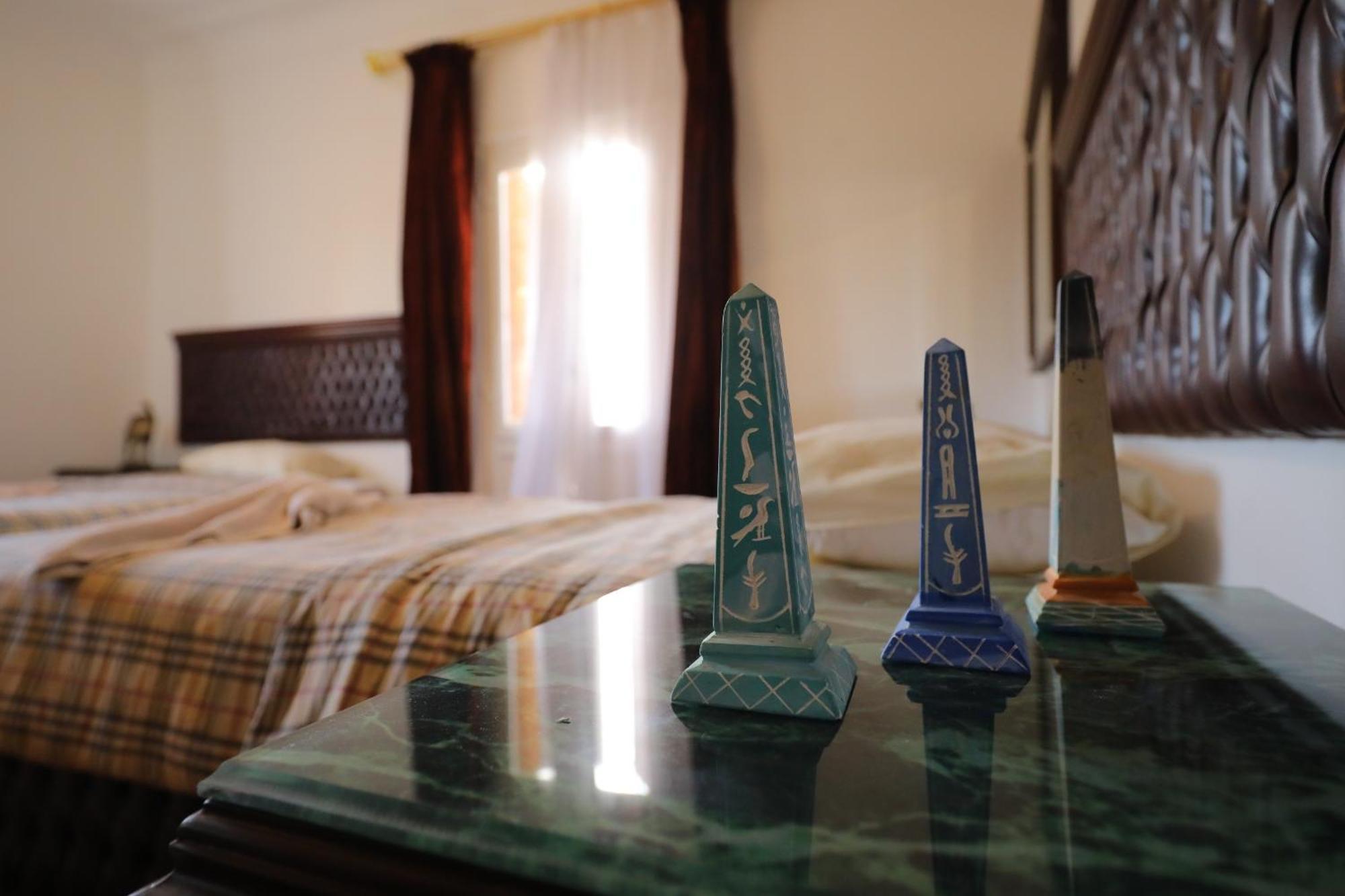 Pyramids Loft Guesthouse Cairo Quarto foto