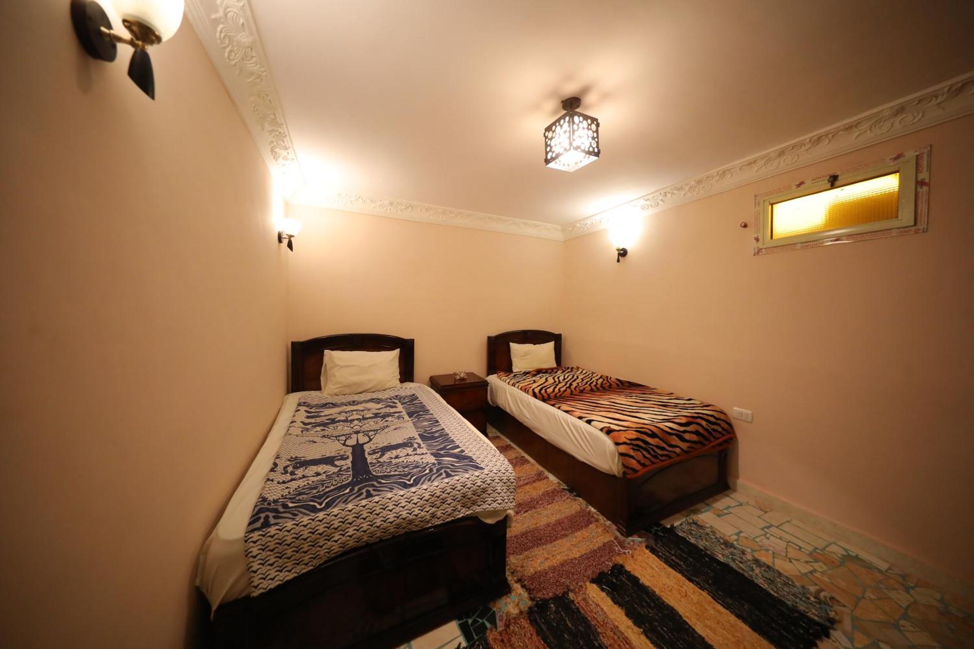 Pyramids Loft Guesthouse Cairo Quarto foto