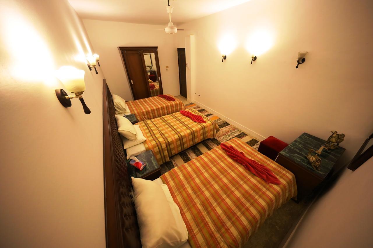 Pyramids Loft Guesthouse Cairo Quarto foto